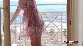 Window flash. Exhibitionist wife caught when she show her nude body at the window. Amateur